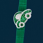 A probably unique car-shaped white gold, diamond and emerald-set wristwatch | Circa 1995