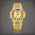 Nautilus, Reference 3800 | A yellow gold, diamond and ruby-set bracelet watch with date, Made in 1994 | 百達翡麗 | NAUTILUS 型號3800 | 黃金鑲鑽石及紅寶石鏈帶腕錶，備日期顯示，1994年製