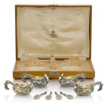 A SET OF FOUR SILVER-GILT AND CLOISONNÉ ENAMEL KOVSH-SHAPED SALTS AND SPOON, IVAN SALTYKOV, MOSCOW 1899-1908; RETAILED BY FABERGÉ
