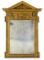 A George II gilt-lead mounted carved giltwood mirror, circa 1740, in the manner of William Kent
