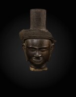 A sandstone head of a deity, probably Shiva Khmer, Banteay Srei style, late 10th century | 高棉 十世紀晚期 班迭斯雷式砂岩雕或為濕婆首像