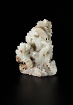 A finely carved pale celadon jade ‘peony and birds’ boulder Qing dynasty, 18th century | 清十八世紀 青白玉雕鳳凰牡丹紋擺件