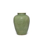 A carved 'Longquan' celadon-glazed 'floral' jar, Ming dynasty | 明 龍泉窰青釉刻纏枝花卉紋罐