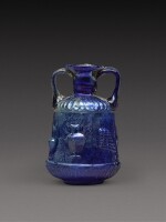 A Roman Cobalt Blue Mould-Blown Glass Amphoriskos, circa 1st century A.D.