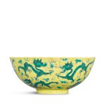 A yellow-ground green-enamelled 'nine dragons' bowl, Seal mark and period of Daoguang 清道光 黃地綠彩九龍逐珠紋盌 《大清道光年製》款