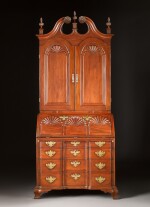 The Important Corlis-Bowen Family Chippendale Block and Shell-Carved and Figured Mahogany Bonnet-Top Desk-And-Bookcase, Attributed to the Shop of John Carlile, Sr., Providence, Rhode Island, Circa 1770