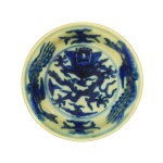 A fine small yellow-ground and underglaze-blue 'dragon' bowl Mark and period of Wanli | 明萬曆 黃地青花龍鳳紋小盌 《大明萬曆年製》款