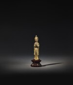 A gilt-bronze figure of a Buddhist devotee Tang dynasty | 唐 鎏金銅供養人立像