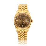 Datejust, Ref. 1601 | A yellow gold wristwatch with date and bracelet  | Circa 1977