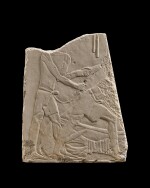  An Egyptian Limestone Relief Fragment, 5th Dynasty, 2494-2345 B.C.
