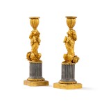 A pair of Louis XVI gilt-bronze and marble "aux chiens savants" candlesticks, late 18th-early 19th century | Paire de flambeaux "aux chiens savants" en marbre et bronze doré, fin XVIIIe-début XIXe siècle