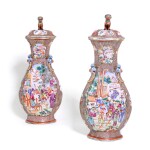 A pair of Chinese Mandarin pattern baluster vases and covers, Qing dynasty, 19th century