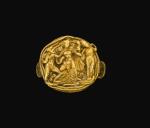 A HELLENISTIC GOLD RING WITH RELIEF DECORATION, CIRCA 3RD CENTURY B.C.