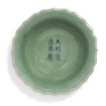 A SMALL INCISED CELADON-GLAZED 'FLORAL' DISH,  XUANDE MARK AND PERIOD