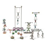 ACROBATS: A GROUP OF SILVER AND ENAMEL CIRCUS FIGURES, DESIGNED BY GENE MOORE FOR TIFFANY & CO., NEW YORK, CIRCA 1990