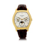 PATEK PHILIPPE | REFERENCE 5040  A YELLOW GOLD TONNEAU-SHAPED AUTOMATIC PERPETUAL CALENDAR WRISTWATCH WITH MOON PHASES, 24-HOUR AND LEAP YEAR INDICATION, MADE IN 1993