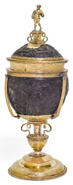 A GERMAN GILT-COPPER MOUNTED COCONUT CUP AND COVER, POSSIBLY NUREMBERG, CIRCA 1550