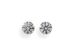 A Pair of 0.56 and 0.55 Carat Round Diamonds, F Color, VS1 and VS2 Clarity