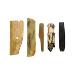 A group comprising a black stone axe, two jade blade fragments and two jade handles Western Zhou dynasty | 西周 各式玉器 一組五件