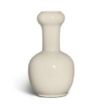 An incised white-glazed vase, Qing dynasty | 清  白釉暗刻花卉紋蒜頭瓶