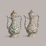 A pair of famille-verte lobed ewers and covers Qing dynasty, Kangxi period | 清康熙 彩繪蝴蝶花卉紋執壺一對