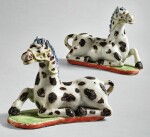 A RARE PAIR OF CHINESE EXPORT FIGURES OF RECUMBENT PIEBALD HORSES, QING DYNASTY, QIANLONG PERIOD, 1770-1780