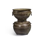 An archaic bronze ritual food steamer (Yan), Eastern Zhou dynasty, early Warring States period | 東周 戰國初 青銅交龍紋鋪首耳甗