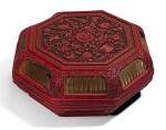 A LARGE CARVED POLYCHROME LACQUER 'BAJIXIANG' BOX AND COVER   QING DYNASTY, QIANLONG PERIOD | 清乾隆 剔彩八吉祥紋八方蓋盒