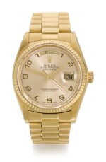 ROLEX |  DAY-DATE, REFERENCE 18038, YELLOW GOLD WRISTWATCH WITH DAY, DATE AND BRACELET, CIRCA 1979