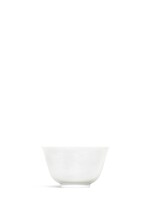 A fine white-glazed anhua-decorated 'dragon' cup, Mark and period of Kangxi | 清康熙 白釉暗劃趕珠龍紋盃 《大清康熙年製》款