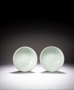 A pair of carved Qingbai 'floral' bowls, Song dynasty | 南宋 青白釉刻花卉紋盌一對