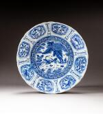 A blue and white fluted-rim 'Kraak'-type 'cranes and pine tree' dish, Ming dynasty, Wanli period | 明萬曆 克拉克瓷青花松鶴延年紋盤