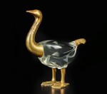 A rare and large fragmentary gilt-bronze figure of a goose, Han dynasty | 漢 銅鎏金鴻雁殘部