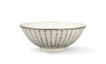 An inscribed blue and white crackled ground bowl and an incised celadon glazed rouleau vase, China-Vietnam, 19th-20th century