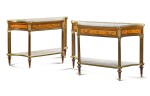 A MATCHED PAIR OF FRENCH GILT-BRONZE AND BRASS MOUNTED SATINWOOD AND AMARANTH CONSOLE DESSERTES, ONE LATE LOUIS XVI, CIRCA 1790, THE OTHER OF A LATER DATE