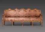 A North Italian carved walnut sofa, probably Parma, mid-18th century