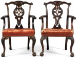 A pair of George II style carved mahogany armchairs, late 19th century