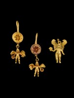 A Pair of Hellenistic Gold-Disk-and-Eros-Pendant-Earrings and a Gold Eros Pendant, circa 2nd half of the 3rd century B.C
