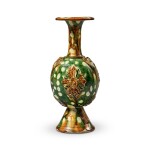 A rare sancai-glazed pottery bottle vase, Tang dynasty | 唐 三彩貼花瓶