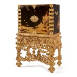 A JAPANESE BRASS-MOUNTED LACQUER CABINET ON A CARVED GILTWOOD STAND, THE CABINET EDO PERIOD, LATE 17TH/EARLY 18TH CENTURY, THE STAND LATER