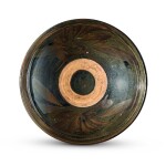 A black-glazed russet-decorated 'floral' bowl, Jin dynasty | 金 黑釉鐵鏽花紋盌