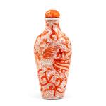 An iron-red-decorated 'phoenix' snuff bottle, Qing dynasty, 19th century | 清十九世紀 礬紅彩夔鳳紋鼻烟壺