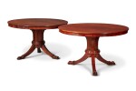 A Matched Pair of German Neoclassical Carved Mahogany Tilt-Top Centre Tables