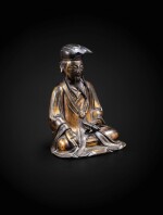 A gilt bronze seated figure of a scholar Ming dynasty, 17th century | 明十七世紀 鎏金銅人物坐像