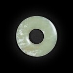 A superb celadon jade disc, bi Neolithic period, Hongshan culture | 新石器時代 紅山文化青白玉璧