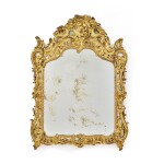 A Louis XV Carved Giltwood Mirror à Compartiment Circa 1730