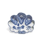 An Extremely Rare Chinese Export Blue and White 'Hundred Antiques' Shell-Shaped Dish, Qing Dynasty, Kangxi Period