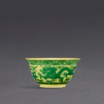 A yellow-ground green-enamelled 'dragon' bowl, Mark and period of Kangxi | 清康熙 黃地綠彩雲龍戲珠紋盌 《大清康熙年製》款