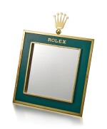  ROLEX | A GILT BRASS AND GREEN ENAMEL RETAILER'S DISPLAY MIRROR WITH WOODEN BACK, CIRCA 1960