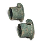 A pair of archaic bronze axle caps and linchpins, Eastern Zhou dynasty, Warring States period | 東周 戰國 青銅軎連獸首轄一組兩套